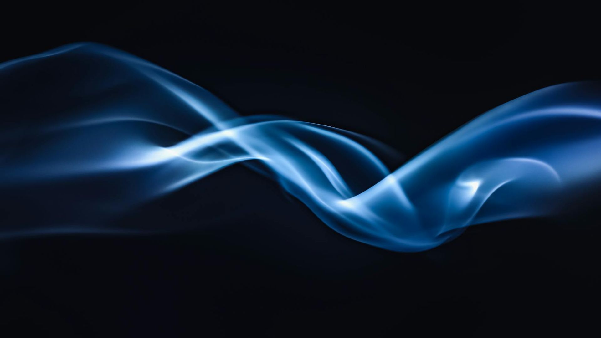 Abstract serene background with soft cyan light trails on a dark void backdrop, evoking a sense of calm movement.